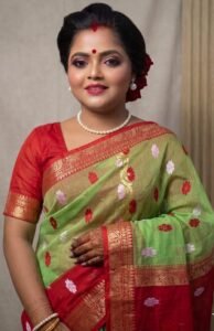 Pastel Green Jamdani Saree with Red Border and Floral Motifs